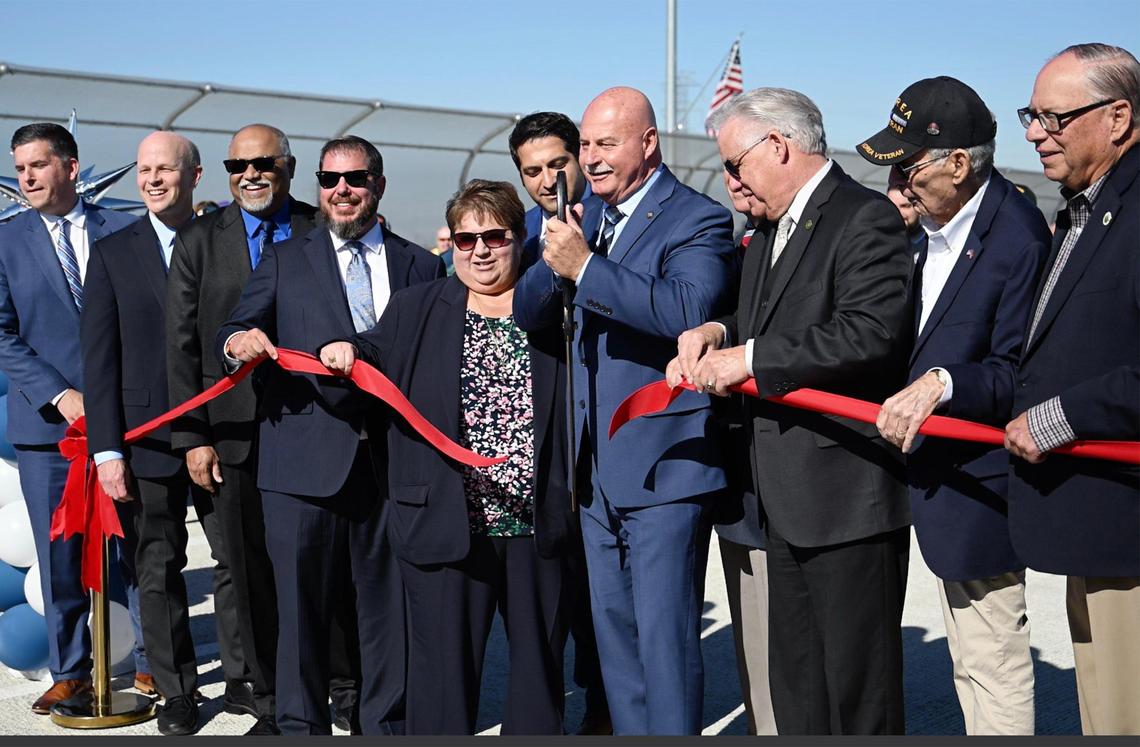 City and agency dignitaries cut the ribbon at the grand opening of Veterans Boulevard Monday, Nov. 20, 2023 in Fresno.