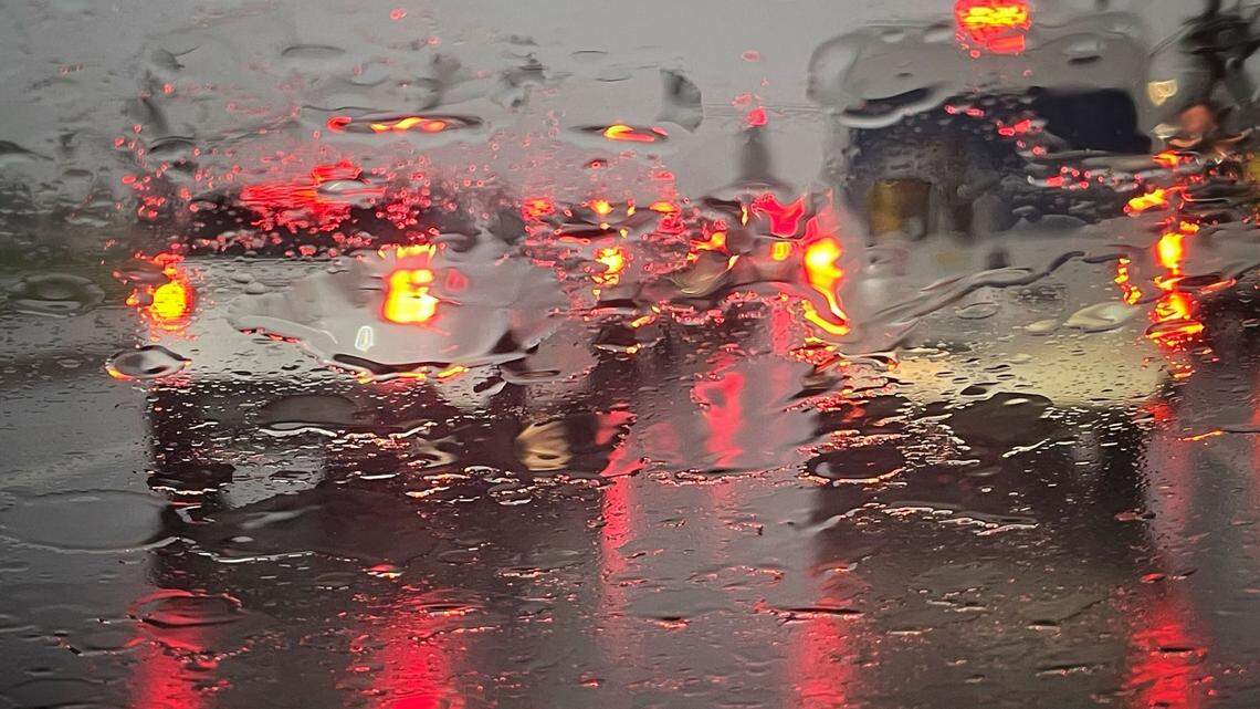 Rain hammers drivers on South Clovis Avenue near Tulare Avenue in Fresno, California, in this file photo from Jan. 5, 2023. Lighter rain is expected to hit Fresno Saturday and Sunday.
