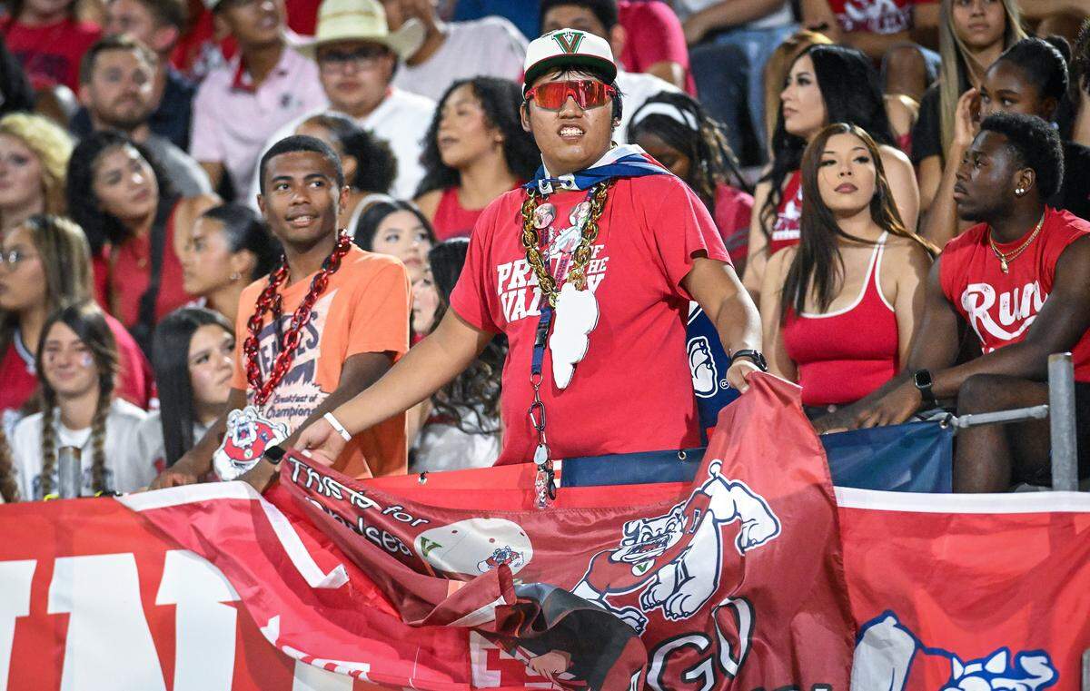Fresno State fans keep watch over the action from the student section during the Bulldogs game with Southern University at Valley Children's Stadium on Friday, Sept. 13, 2025. 