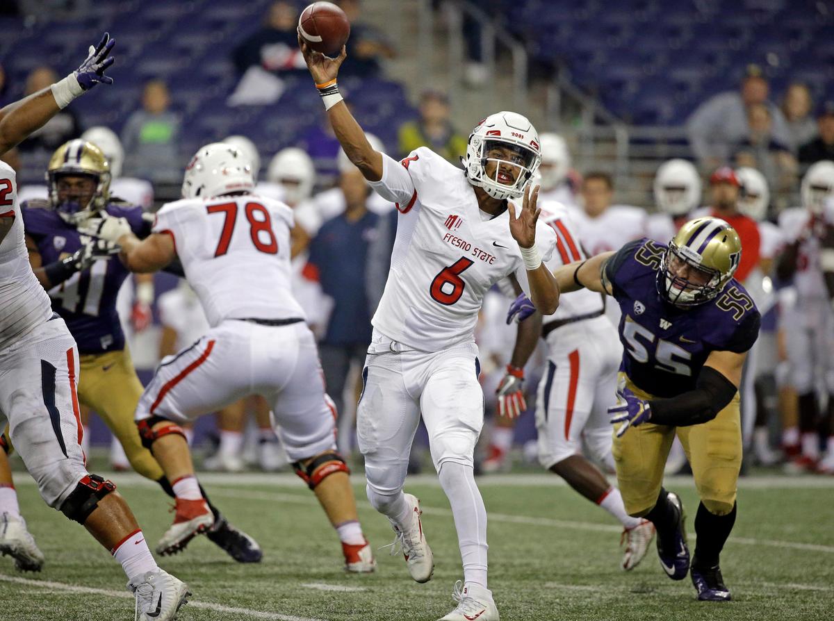 Fresno State quarterback Marcus McMaryion fires a pass in a loss at Washington Saturday, Sept. 16, 2017, in Seattle. The Bulldogs’ have averaged just 17.8 points in their past nine games against Power Five opponents.