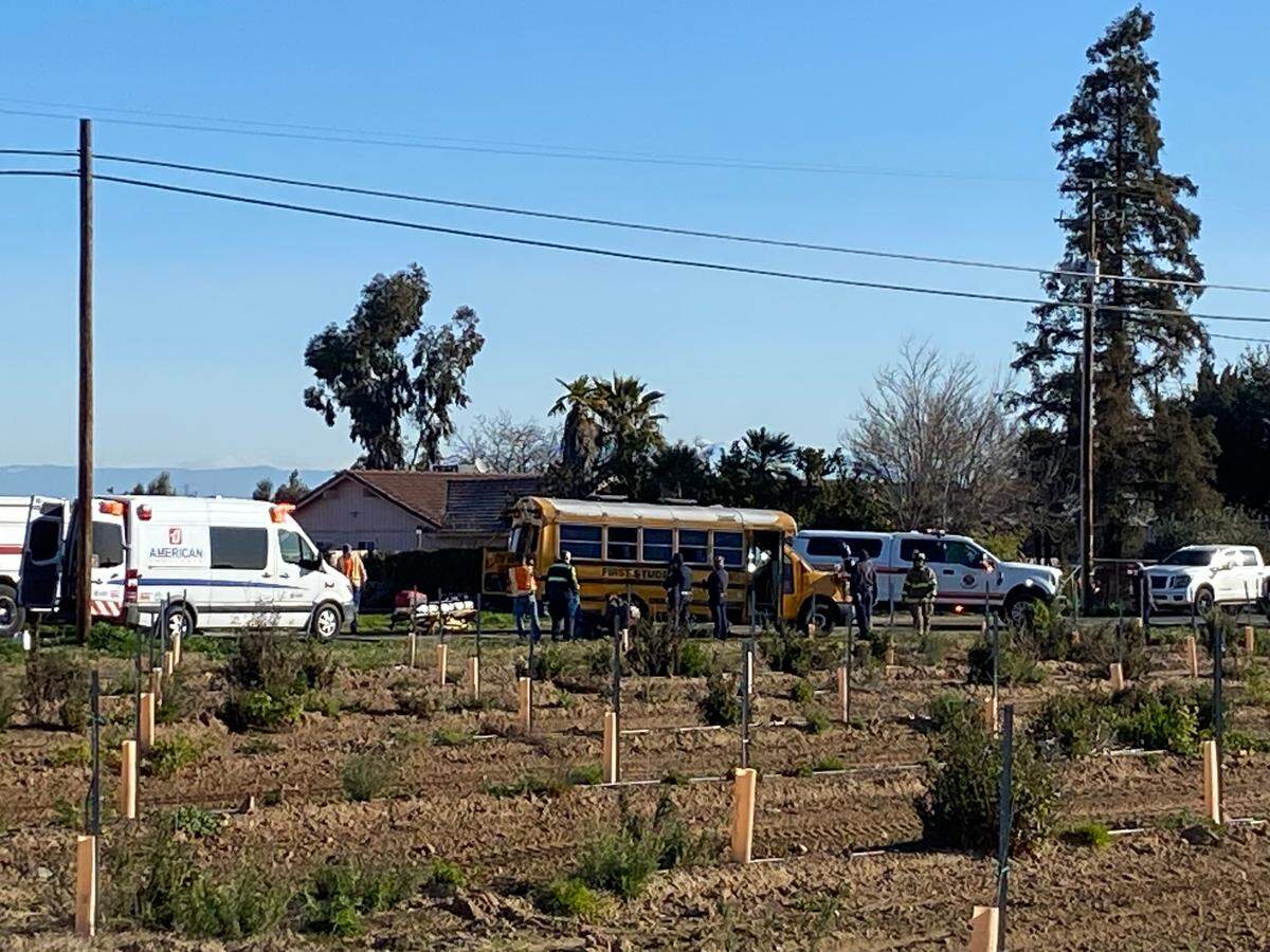 Officers investigate where a school bus carrying special needs children was involved in a suspected DUI crash in Fresno County on Wednesday, Feb. 15, 2023.