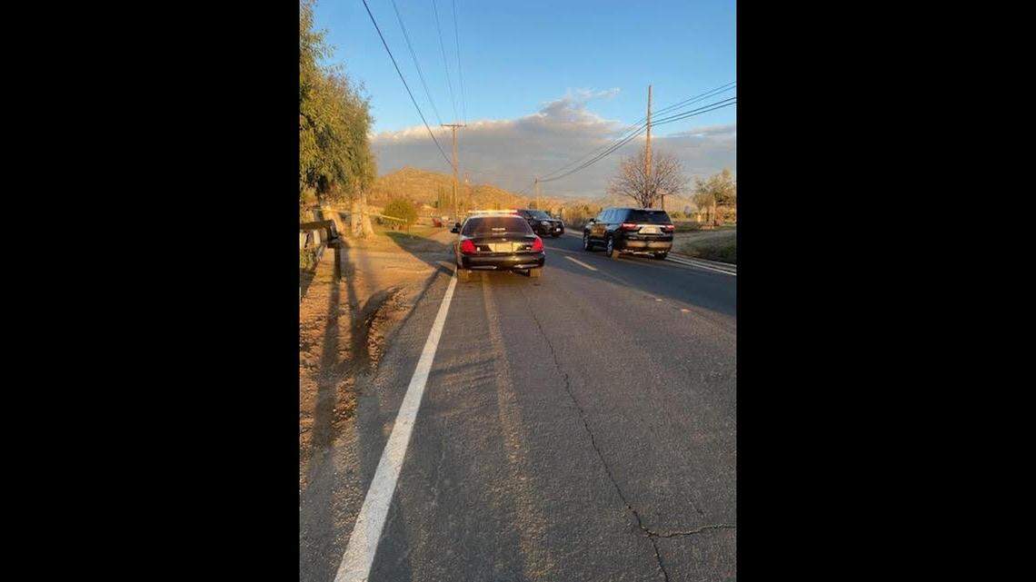 Tulare County deputies at the scene of an apparent domestic violence shooting death Saturday evening near Woodlake.