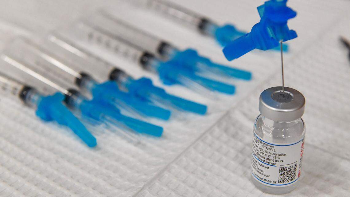 Syringes with Moderna COVID-19 vaccination doses await administering during a Fresno County rural vaccine clinic at Orange Cove High School on Tuesday, March 16, 2021.