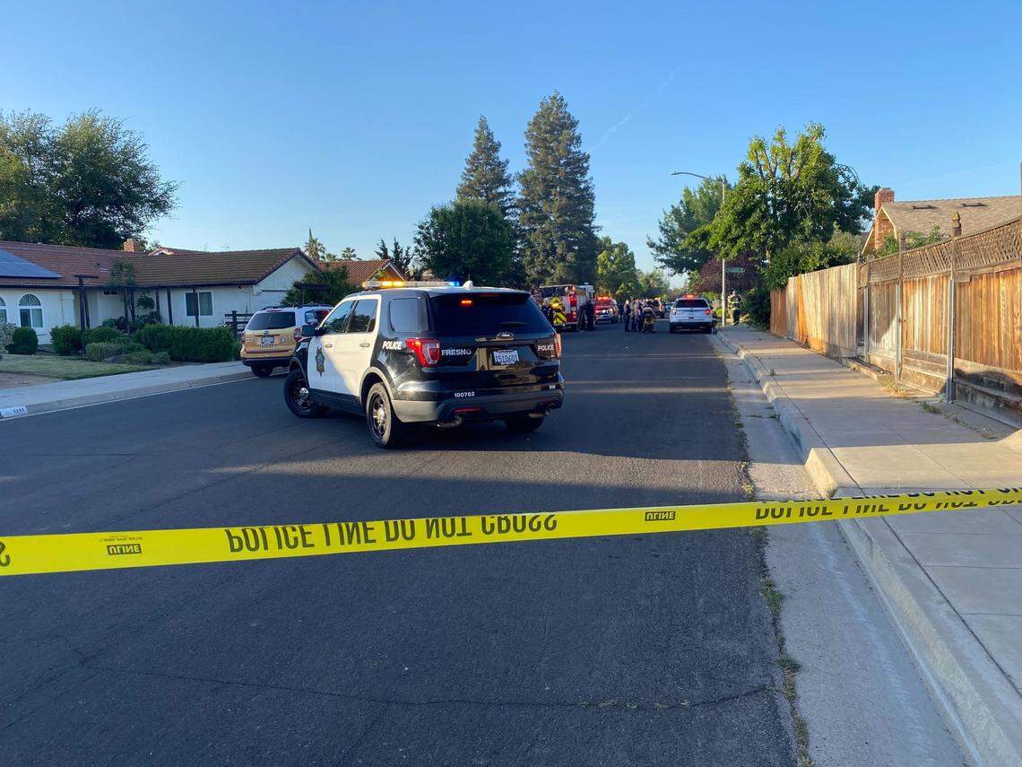 Emergency personnel respond to a house fire in the 3600 block of West Robinson Avenue on Tuesday morning, May 3, 2022.