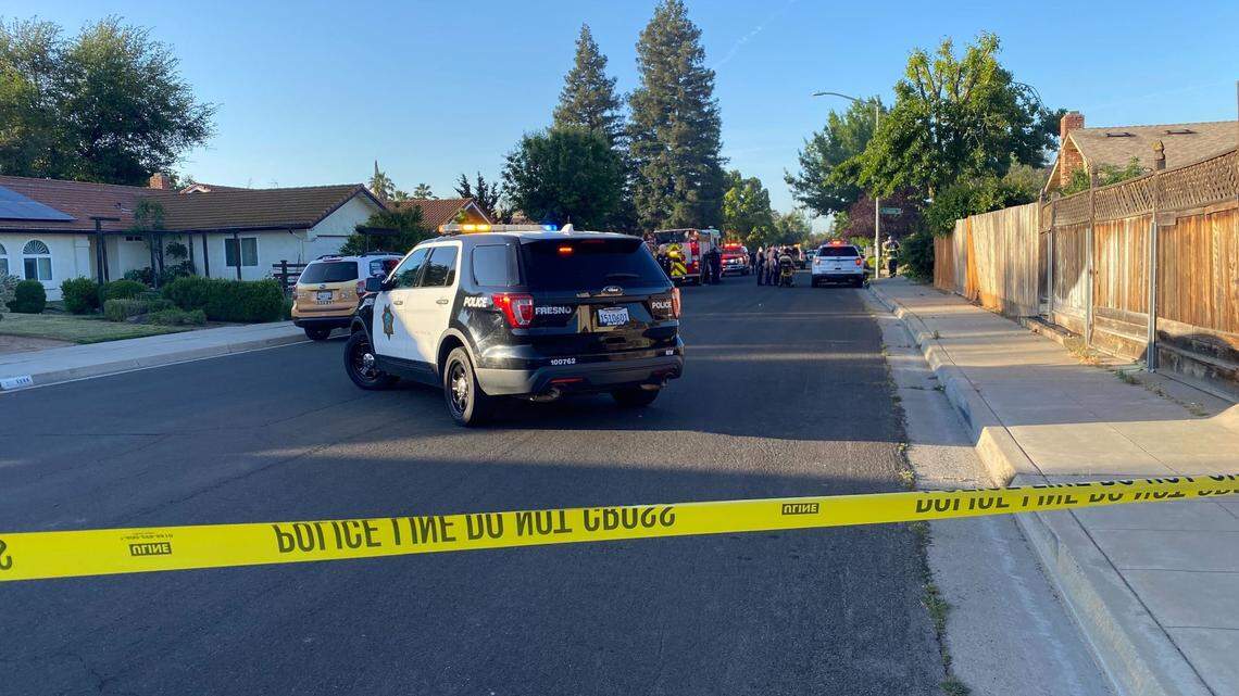 Emergency personnel respond to a house fire in the 3600 block of West Robinson Avenue on Tuesday morning, May 3, 2022.
