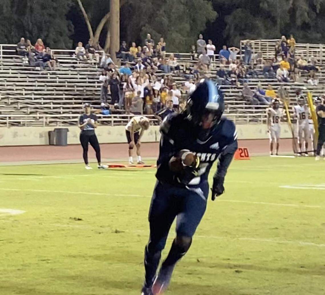 Bullard High WR Daizon Allen scores on a 5-yard reception in the fourth quarter and adds a two-point conversion to help Bullard to a 14-12 win over Turlock at Ratcliffe Stadium on Friday, Sept. 3, 2021.
