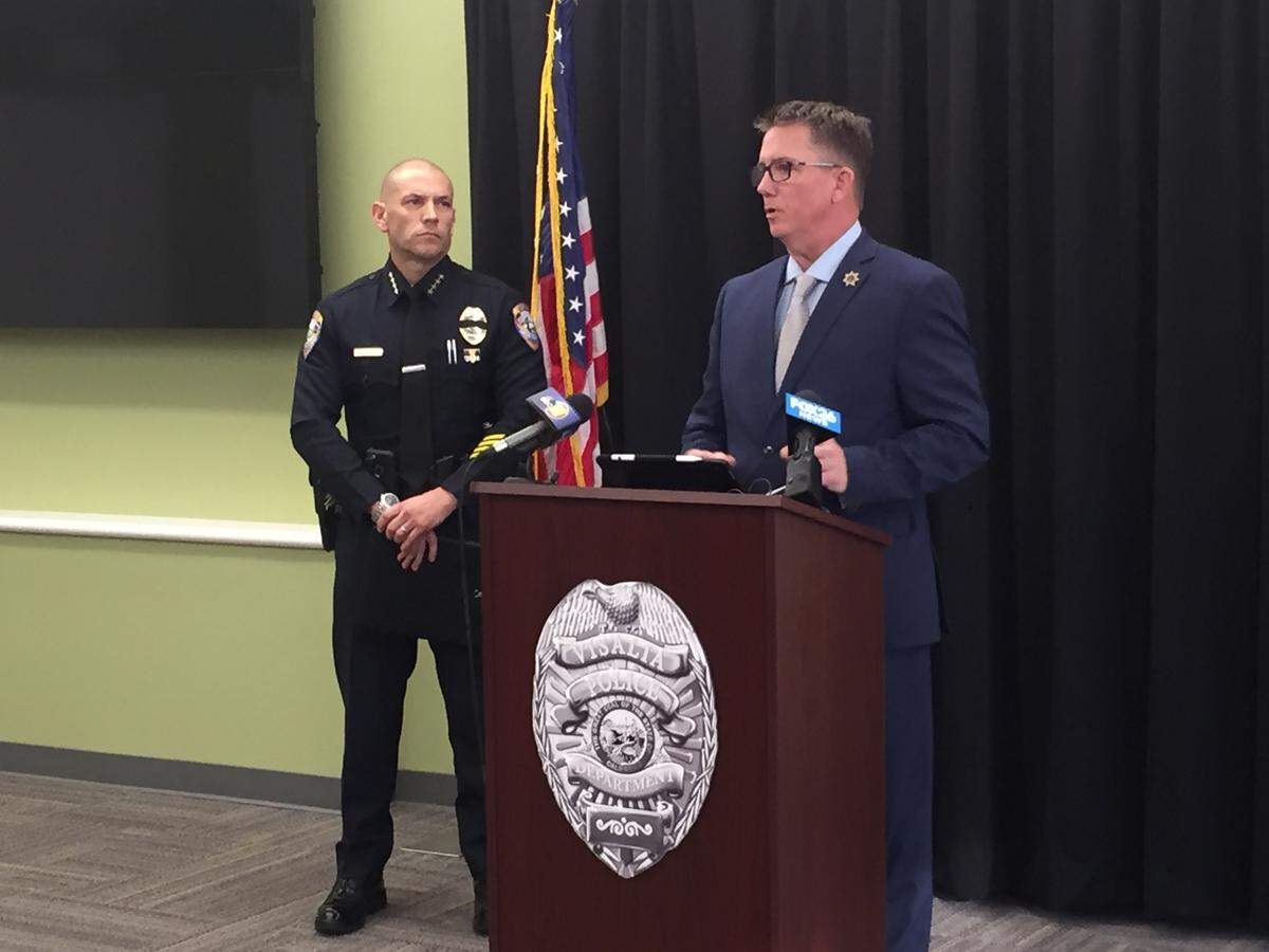 Tulare County District Attorney Tim Ward, right, with Visalia Police Chief Jason Salazar, left, announces charges filed against Visalia police officers Bryan Ferreira and Shane Logan on Friday, Nov. 16, 2018.
