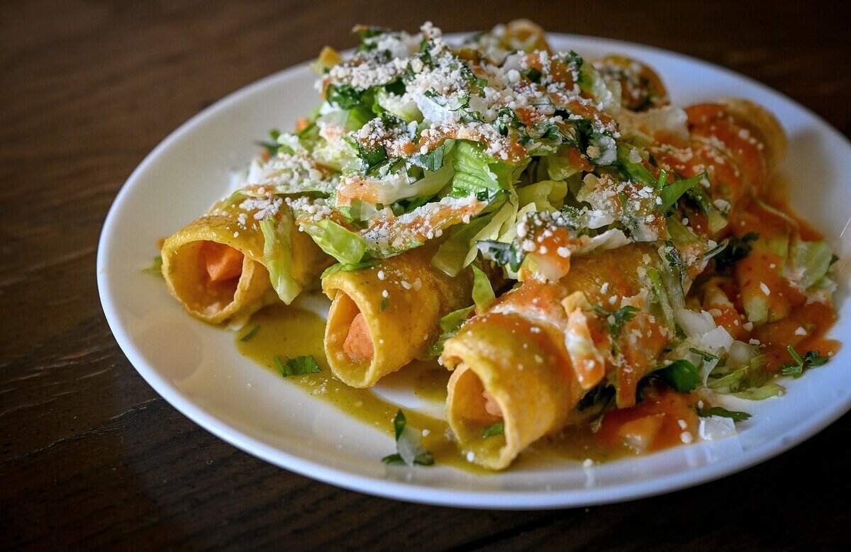 Flautas are prepared by the “Flauta Kings,” Anthony Dimmick and David Galaviz, who have been serving up their homemade flautas to hungry residents and businesses since the COVID pandemic.