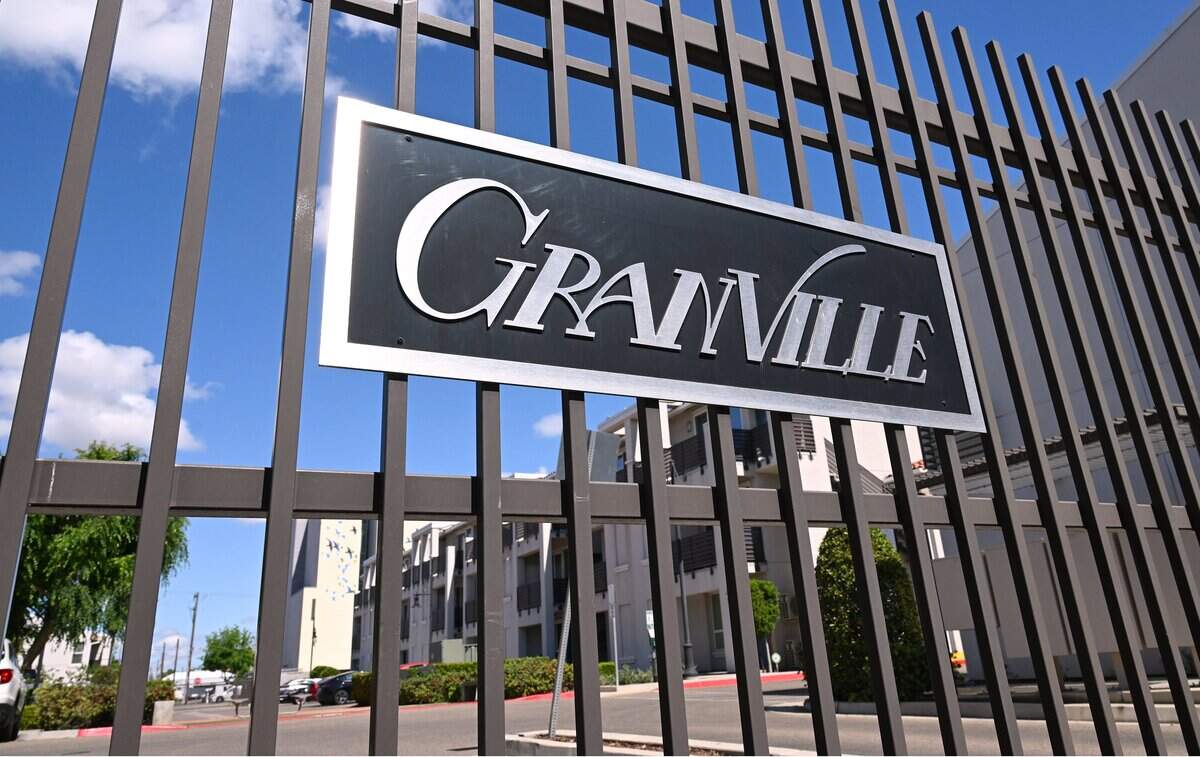 A gated entry for The Lede by Granville Homes, photographed Wednesday, April 22, 2026 in downtown  Fresno. Granville Homes has posted its entire portfolio for sale.