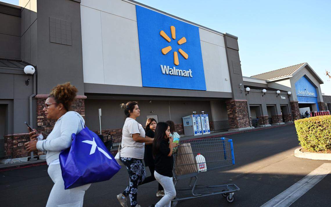 Customers leave and arrive the Walmart Supercenter in Sanger which has reportedly been running on two generators, creating a noise issue for the neighborhood. Photographed Friday, Nov. 21, 2025 in Sanger.