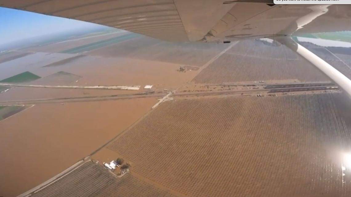 A Tulare County sheriff’s aircraft flies over a flooded area of the county Sunday morning. Allensworth and Alpaugh were under evacutaion orders.