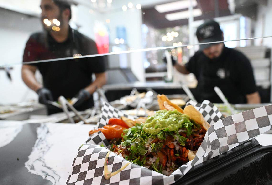 Food is quickly prepared by taqueros at newly-opened Frida’s Azul at Herndon and Willow avenues Thursday, July 24, 2025 in Clovis.