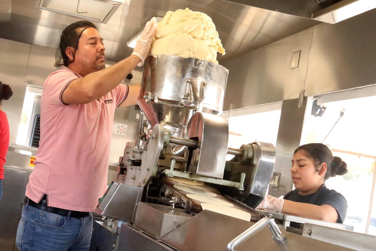Benjamín Serrato and Maribel Reyes are employees of Tortillería Ortuño, which opened its doors at 4542 Belmont Avenue in Fresno on September 10, 2023.