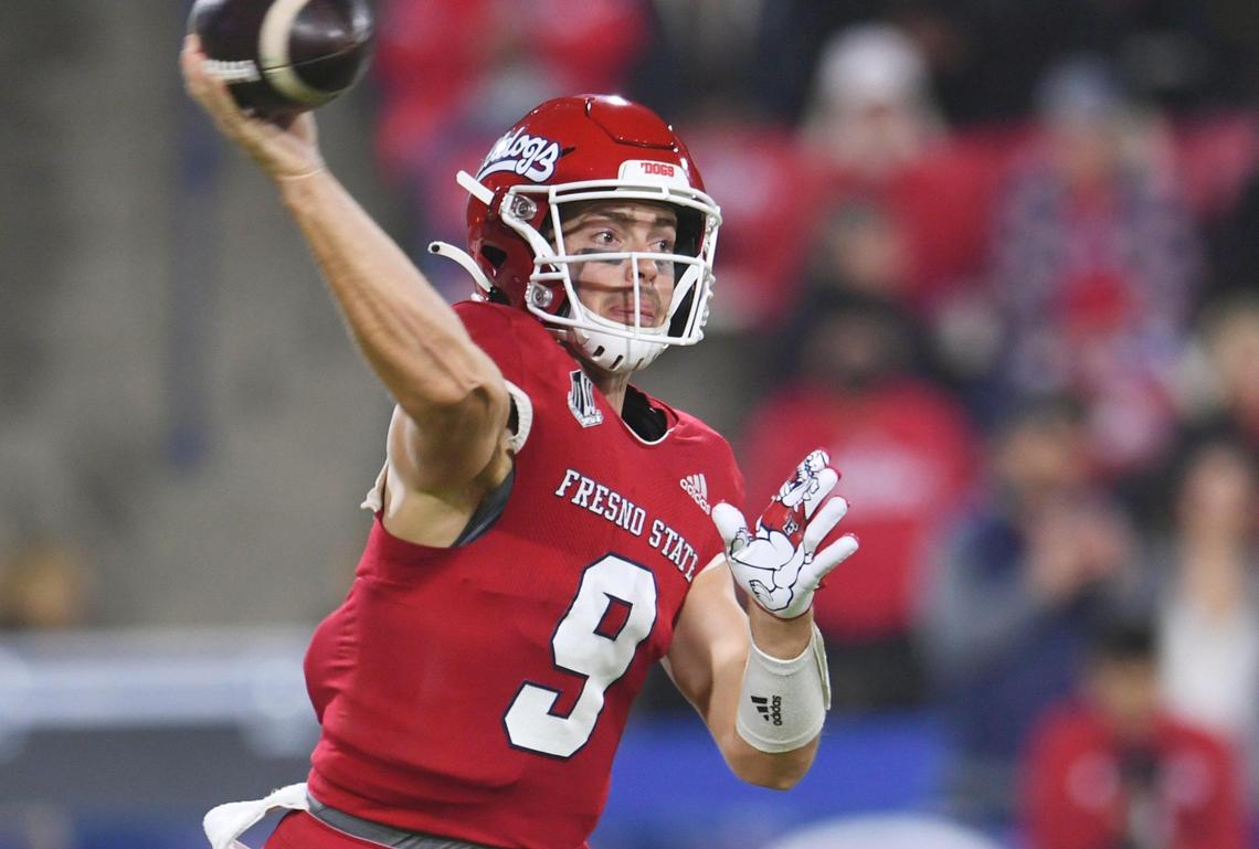 Fresno State quarterback Jake Haener passes against Wyoming Friday, Nov. 25, 2022 in Fresno. The Bulldogs led 23-0 at halftime.