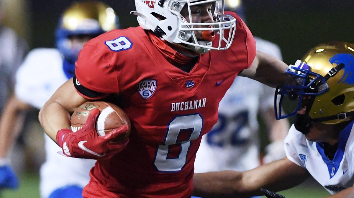 Buchanan’s Josiah Ayon fights off Clovis defense Thursday, April 1, 2021 in Clovis.