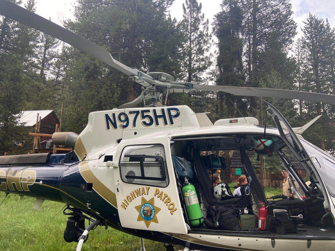 A CHP helicopter that landed near Muir Trail Ranch to retrieve the body of Nicholas Torchia, who was struck by lightning.