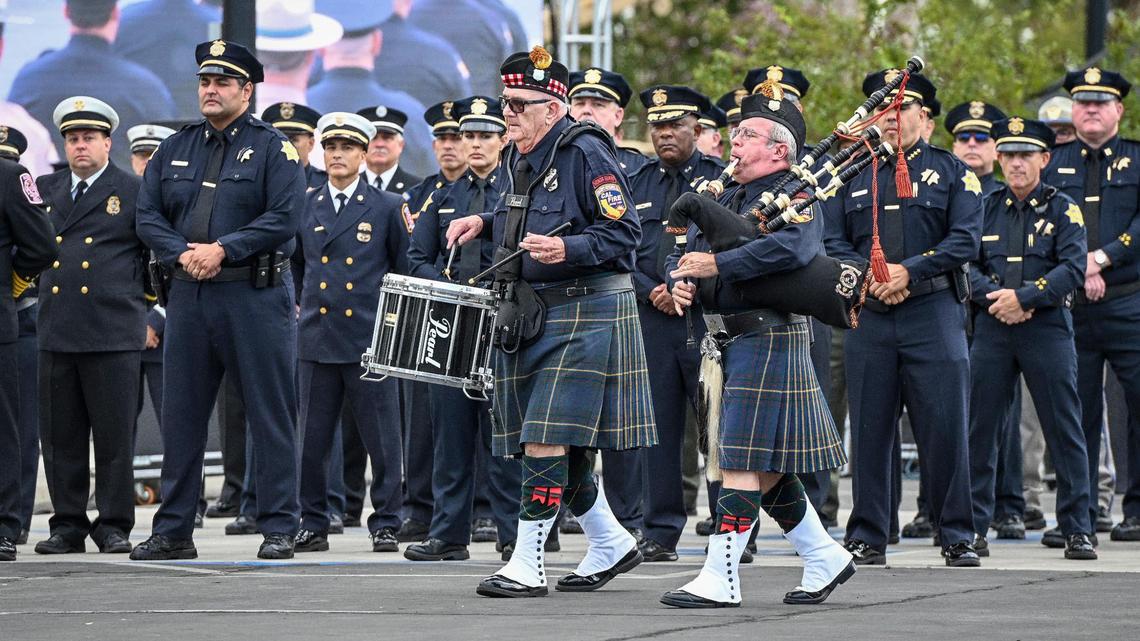 Bagpipes and drums are played as officers from the Fresno Police Department stand in formation during the 21st anniversary September 11 Memorial Ceremony at the California 9/11 Memorial in Clovis on Sunday, Sept. 11, 2022.