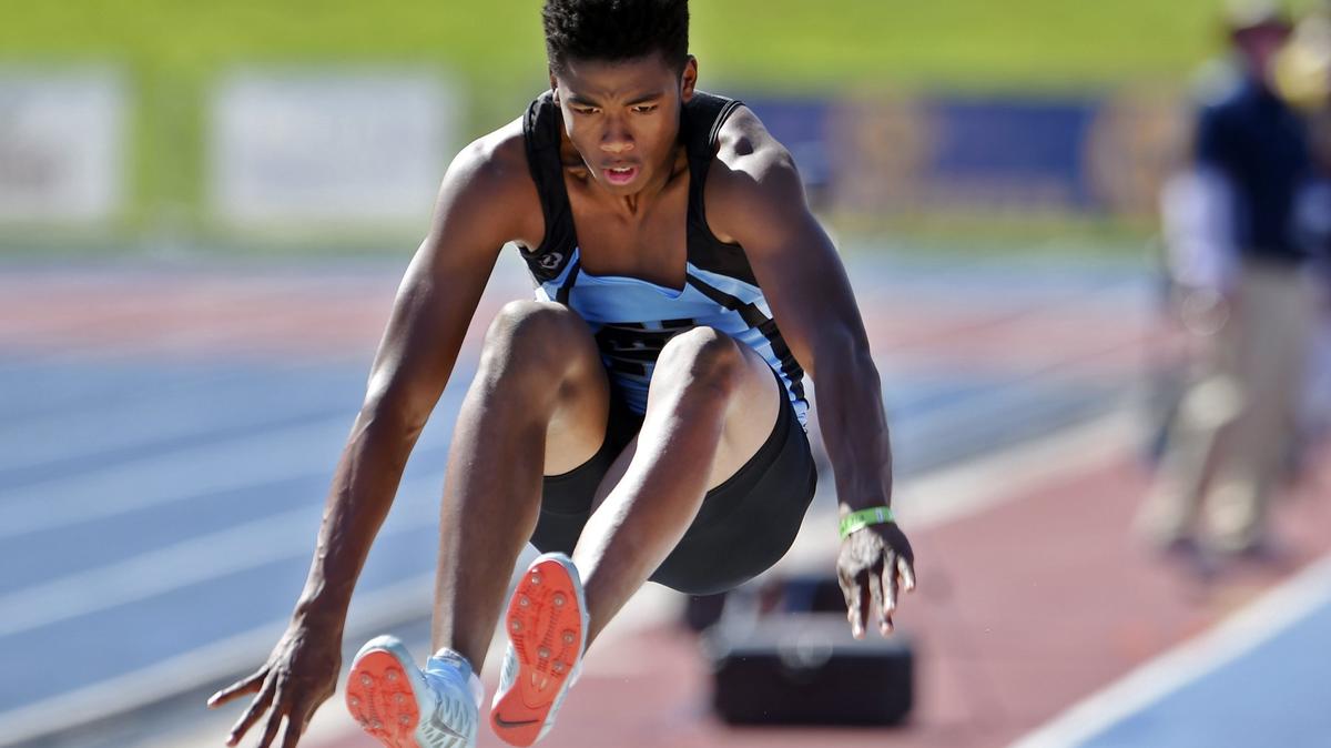 Clovis North's Caleb Foster competes in the long jump during preliminaries on day one of the two-day CIF State Track and Field Championships Friday, June 1, 2018 in Clovis.