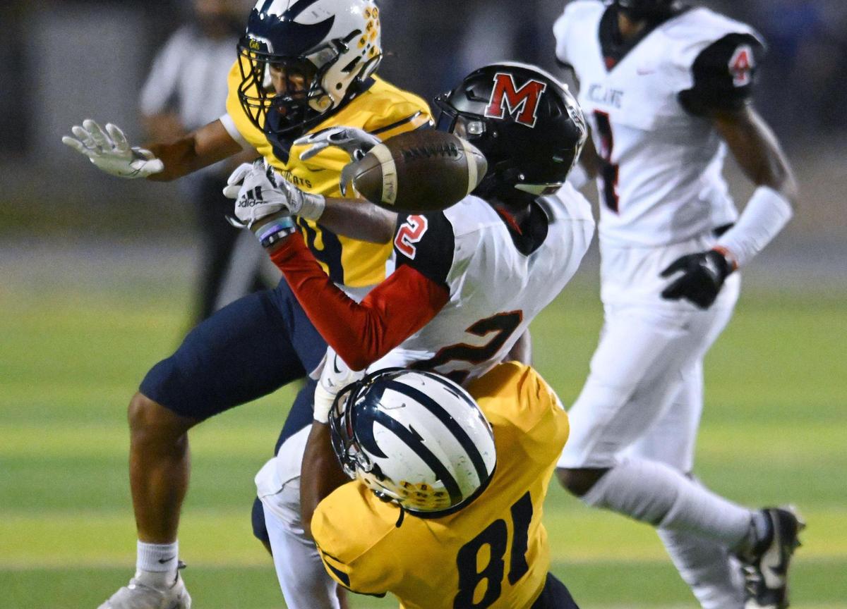 The ball pops out of McLane’s Demitrius Simon’s hands as he’s tackled by Sunnyside Friday, Oct. 20, 2023 in Fresno.