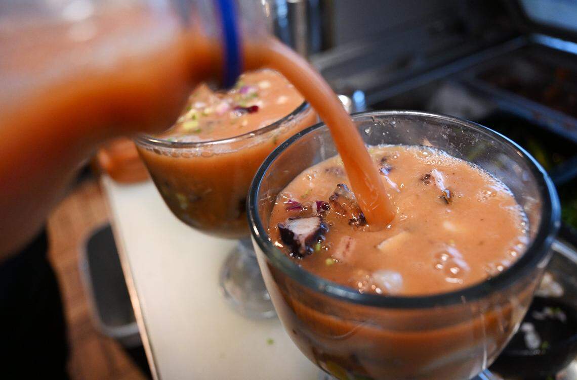 An El Botanero Cocktail with shrimp, octopus, aguaschile, scallops and oysters is created at El Botanero Mariscos Wednesday, August 6, 2025 in Fresno.