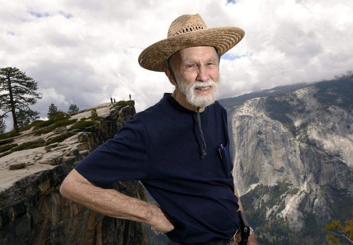George Whitmore, one of the three men on the first team to climb El Capitan in Yosemite Valley, is seen on a hike to Taft Point with El Capitan in the background across Yosemite Valley on May 26, 2016.
