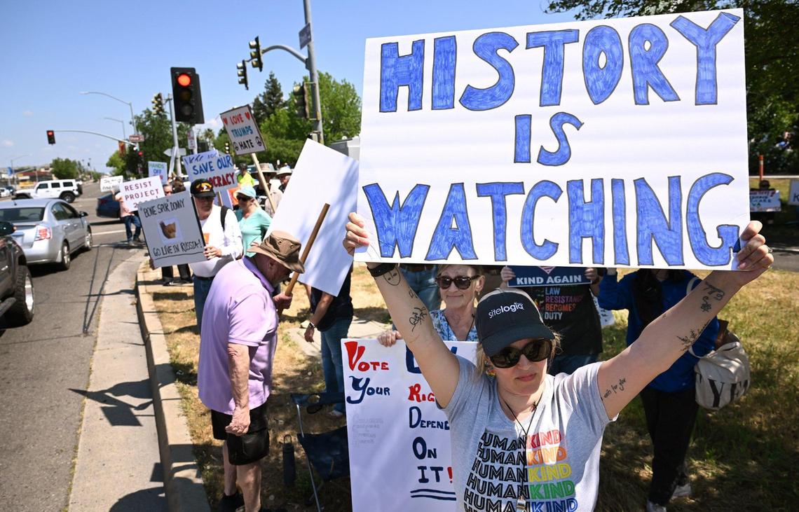 More than 400 people gathered for a Hands Off rally with the theme No Kings at Clovis and Shaw avenues Saturday, April 19, 2025 in Clovis.