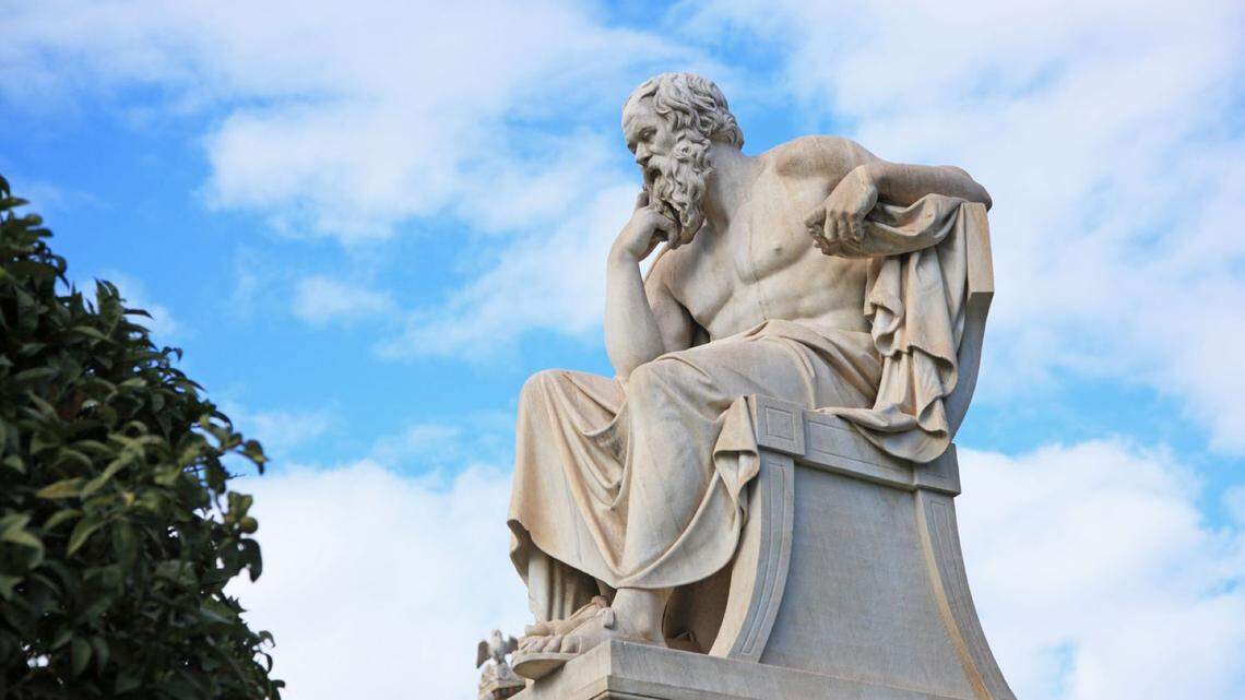 The Greek philosopher Socrates as imagined in this statue in Athens. It is made of white marble by sculputer Leonidas Drosis. Socrates is famous for saying, “The unexamined life is not worth living.”