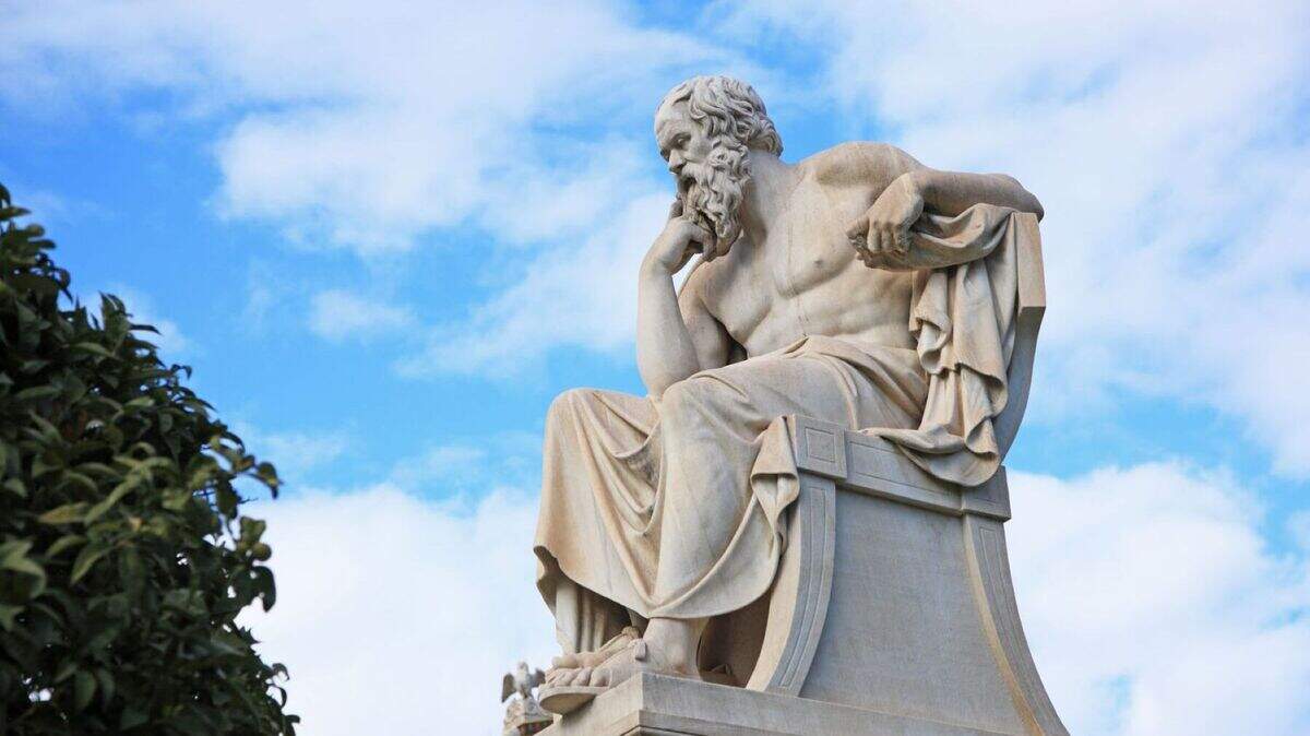 The Greek philosopher Socrates as imagined in this statue in Athens. It is made of white marble by sculputer Leonidas Drosis. Socrates is famous for saying, “The unexamined life is not worth living.”
