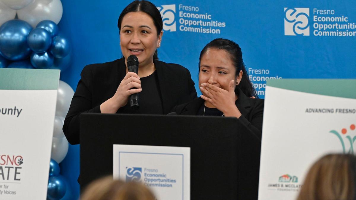 An emotional Nancy Ramirez, right, one of 150 recipients for the new Advancing Fresno County Guaranteed Income program to fight poverty, thanks the program for being chosen Wednesday, July 17, 2024 in Fresno. The program will provide $500 a month for one year to 150 chosen families to help fight poverty.