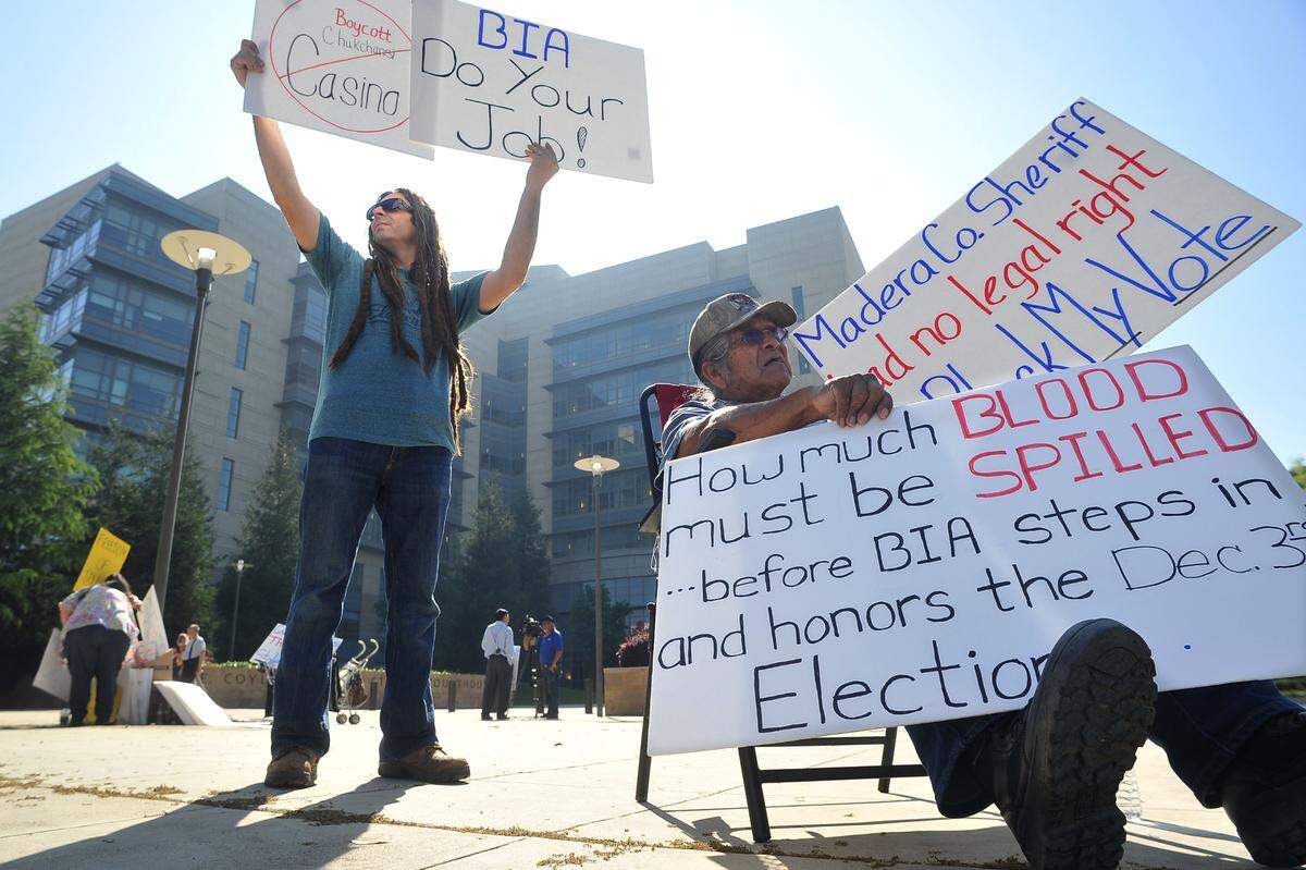 Protesters in front of Fresno’s federal courthouse in April 2012 urge the Bureau of Indian Affairs to get involved in a Picayune Rancheria of the Chukchansi Indians’ leadership dispute. Protesters stressed a lack of action from the federal government.