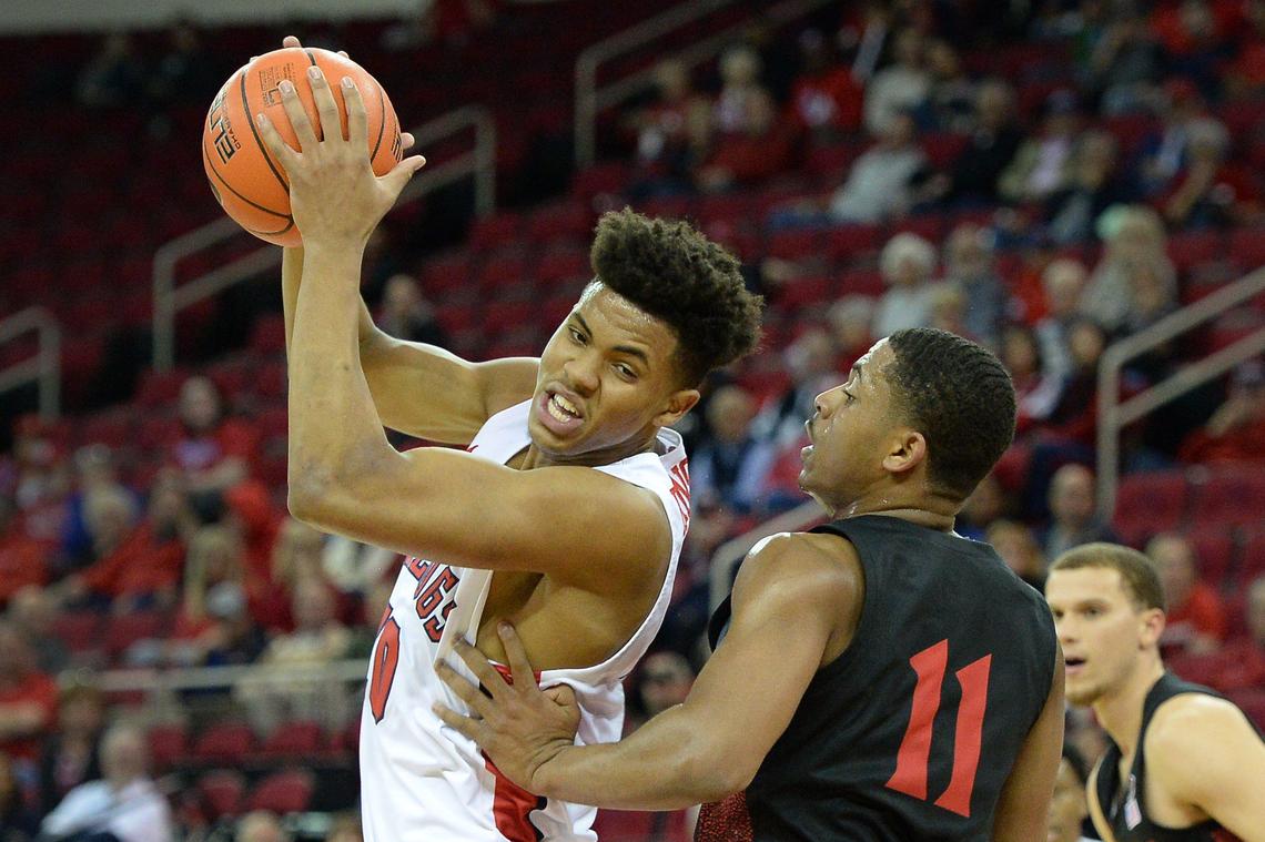 Fresno State forward Orlando Robinson, left, tries to move around San Diego State’s Matt Mitchell during the Bulldogs 64-55 loss to the Aztecs at the Save Mart Center in Fresno on Tuesday, Jan. 14, 2020. Robinson led the Bulldogs with 18 points and also had six rebounds, two assists, two steals and one blocked shot.