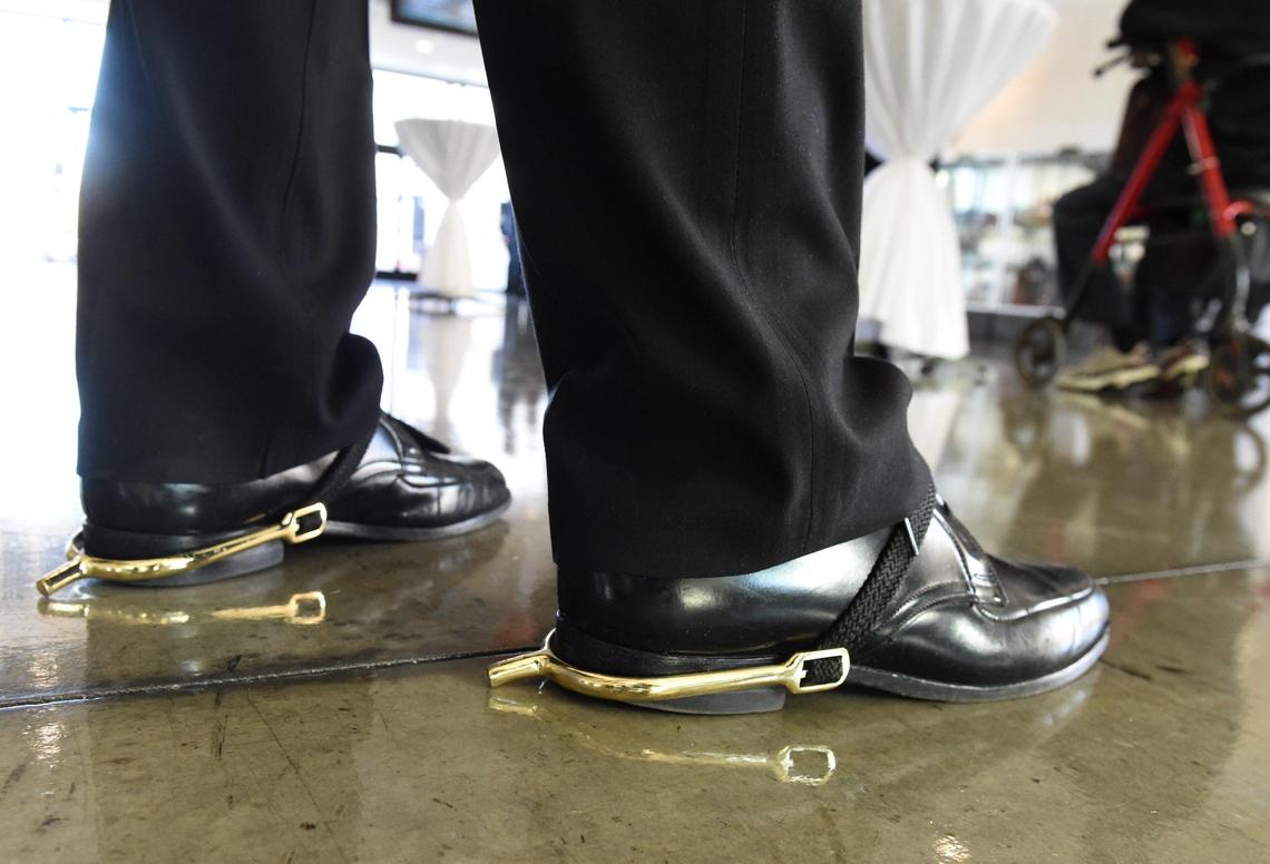 World War II Army veteran Vernon Schmidt, 96, wore spurs to his medal award ceremony in honor of fallen members of his calvary unit.