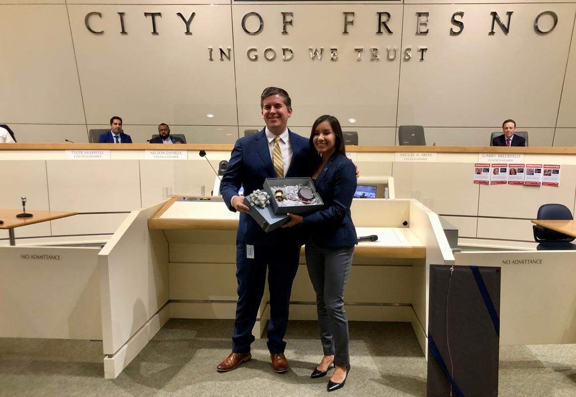 Former Council President Tyler Maxwell passes the gavel to incoming Council President Annalisa Perea on Jan. 11, 2024.