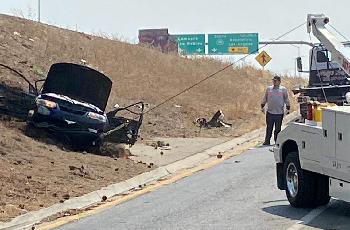 One person was killed and another injured after a car hit a tree and overturned on Highway 41 near O Street on Saturday, Aug. 21, 2021.