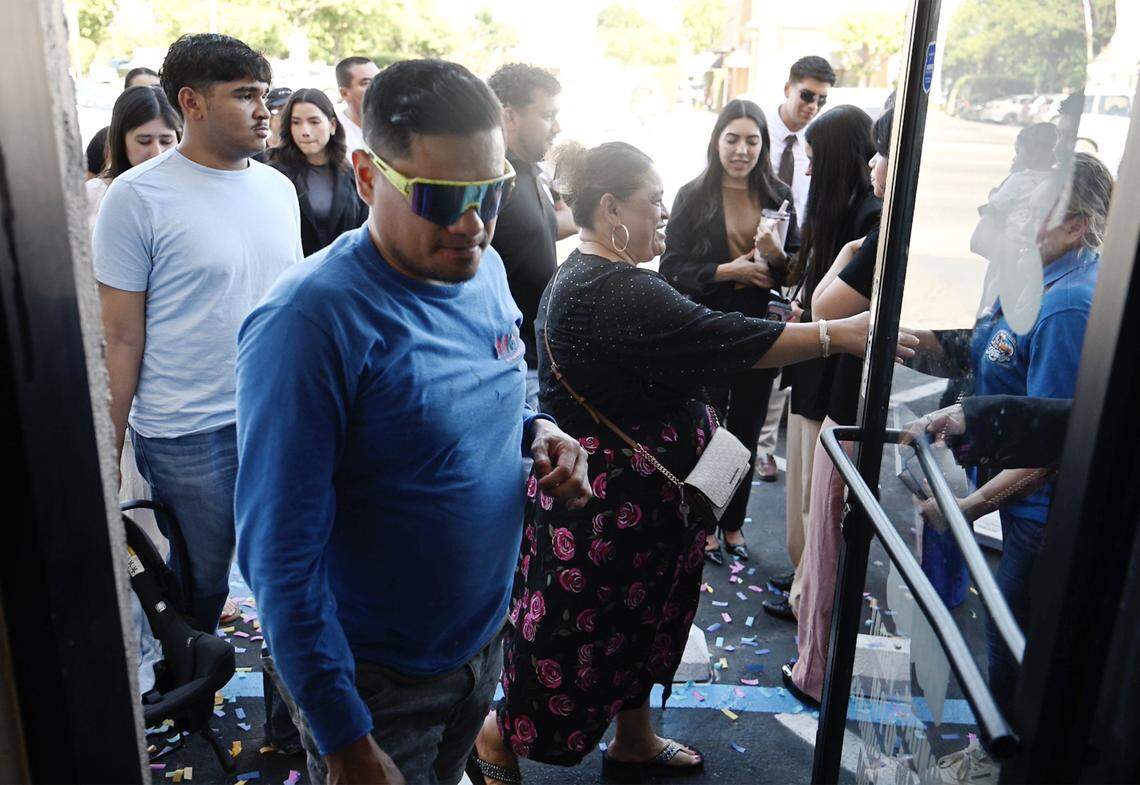 Customers and supporters enter Felix and Beatriz Amador's new Keidy's Restaurant after its grand opening ceremony Friday, July 11, 2025 in Fresno.