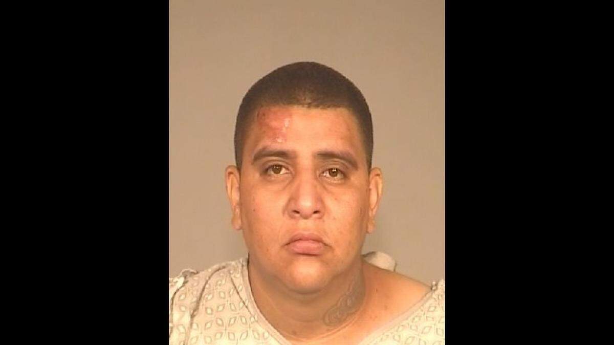 Joshua Parker, 34, was arrested Saturday afternoon after Fresno police say the SUV he was driving crashed into a big rig, killing a 22-year-old female passenger.