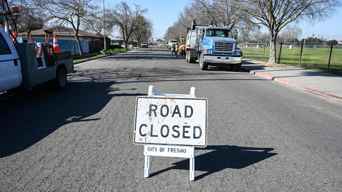 A road closed sign stands on Belgravia Avenue near Computech Middle School in Fresno on Monday, Feb. 7, where Fresno city work crews were installing speed bumps.