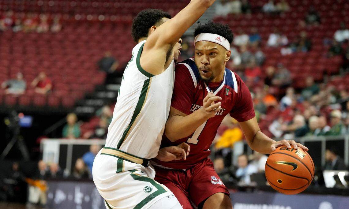 Fresno State guard Jemarl Baker looks for a way into the paint in the Bulldogs’ 67-65 loss to Colorado State in the first round of the Mountain West Conference Tournament.