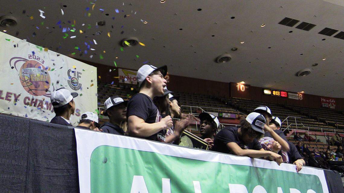 Madera South celebrates a Central Section Division V title at Selland Arena in Fresno, California on Saturday, Feb. 25, 2023.