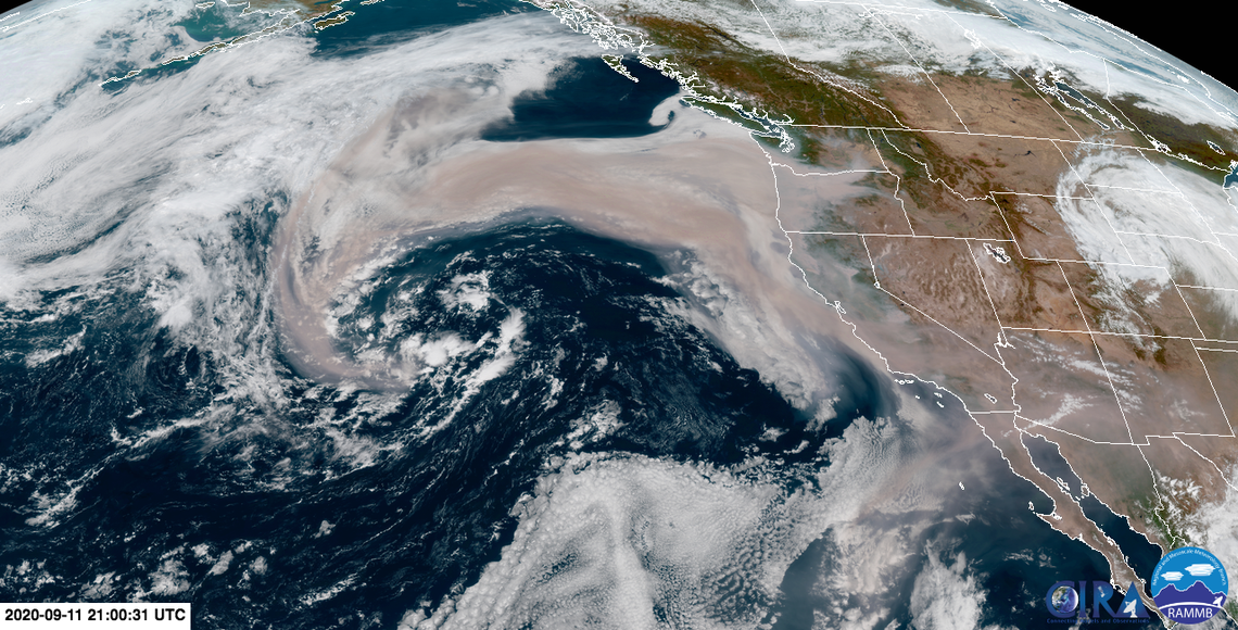 NASA satellite images captured Sept. 11 show a massive layer of smoke swirling over the Pacific West Coast.