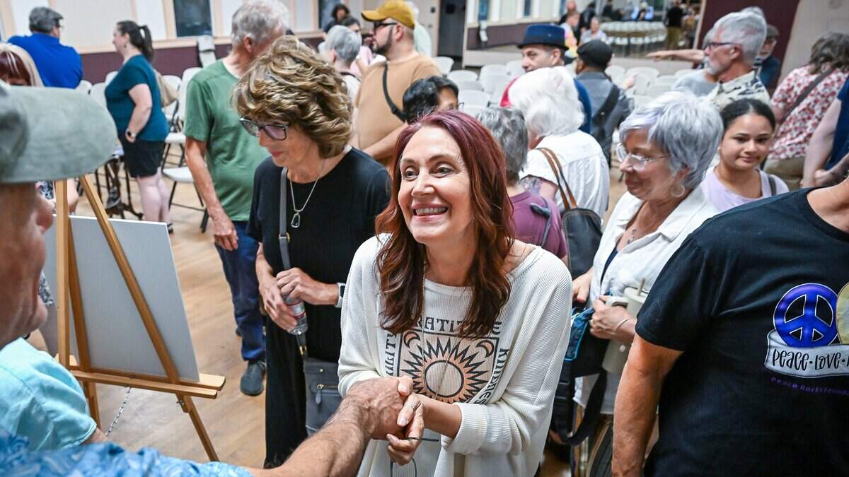 Debi Ruud, owner of Fresno Music Academy & Arts, greets community members and students following a meeting at the Severance School of Dance building in Fresno's Tower District on Tuesday, July 7, 2026. Ruud and her husband John Alden held a community meeting at the recently purchased building to get ideas and answer questions about their plan to move their music school into the building.