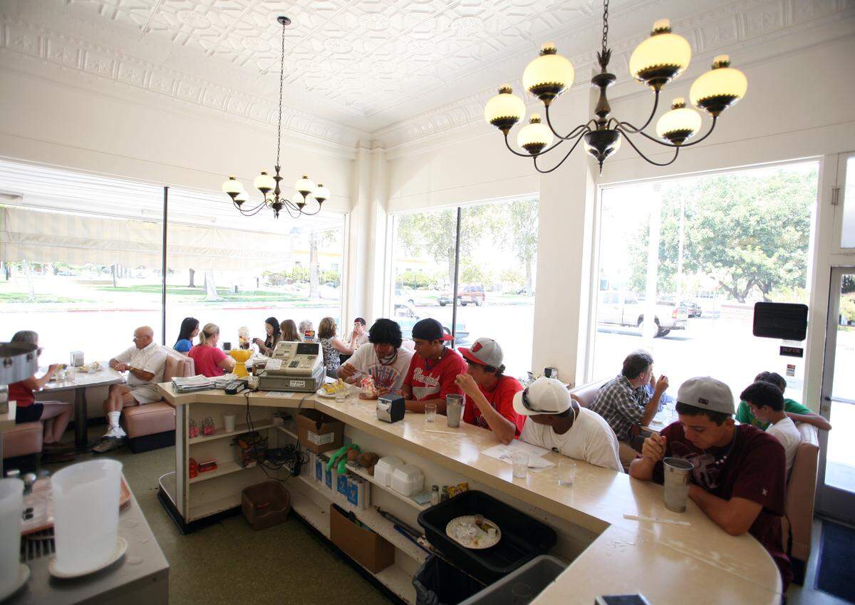 People enjoy the cool treats at Superior Dairy in Hanford, California, in a Bee file photo from July 2009.
