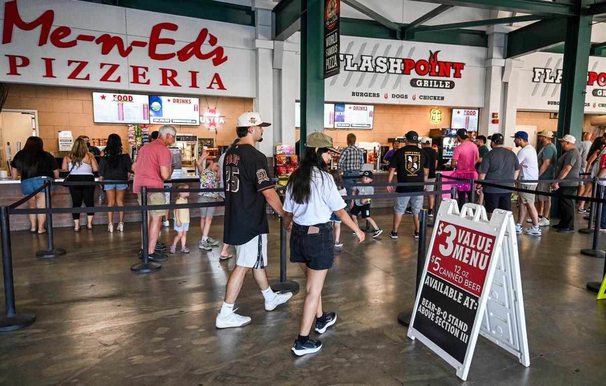 Fresno Grizzlies fans wait in line for food at Chukchansi Park in downtown Fresno on Wednesday, June 11, 2025.