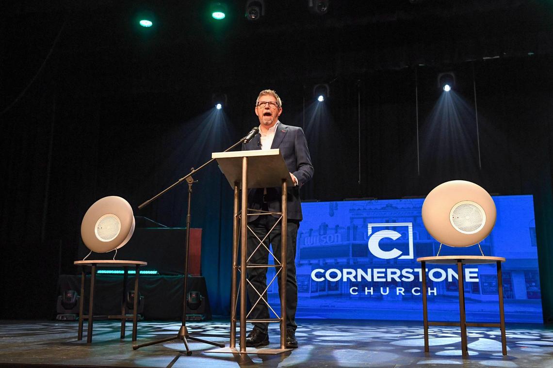 Pastor Jim Franklin of Cornerstone Church, stands on the auditorium stage to announce the installation of several dry hydrogen peroxide, or DHP, units at the church in downtown Fresno on Wednesday, March 10, 2021. Franklin says patented technology will continuously clean the air of potential coronavirus microbes as well as fight against any other viruses, bacteria, mold, odors and even insects.