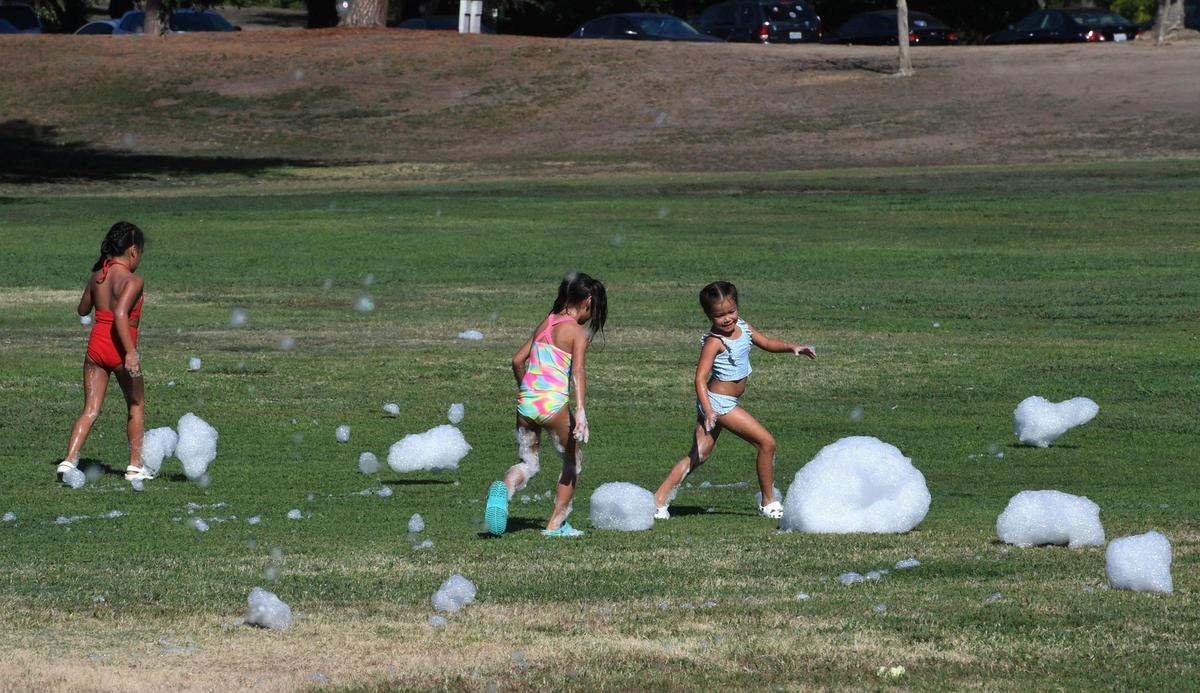 Fresno Foam Party, formed in July, is a company that offers a unique and fun foam experience for parties and other gatherings. Photographed Friday, Aug. 19, 2022 at Woodward Park in Fresno.