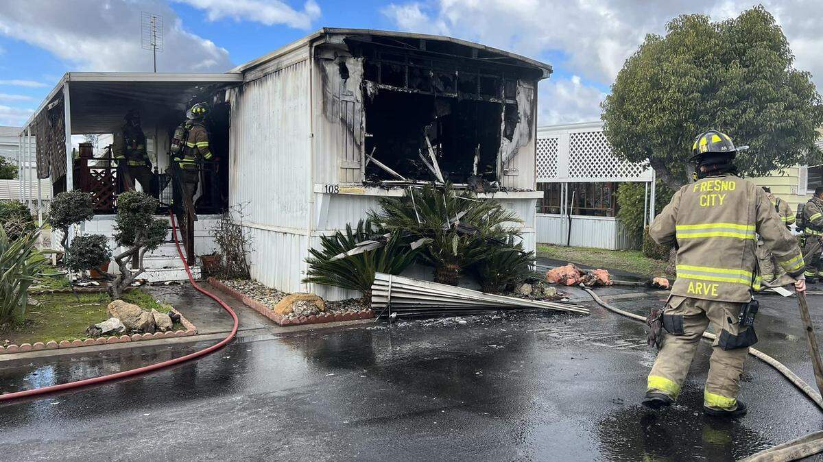 A Fresno mobile home caught on fire Tuesday in the area of Blackstone and Herndon avenues after a stove top burner was left on. A cat woke up the woman inside just in time for her to escape the fire.