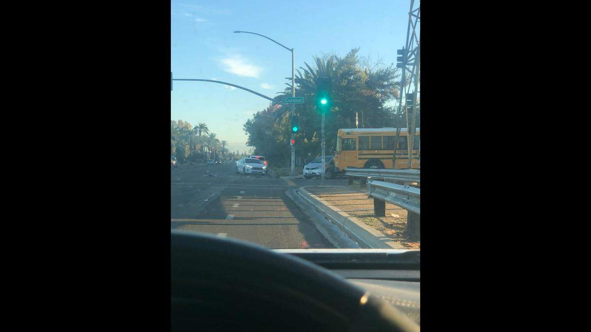 A school bus was hit in chain-reaction crash after two other vehicles collided Wednesday morning, Nov. 2, 2022, in Fresno, California.