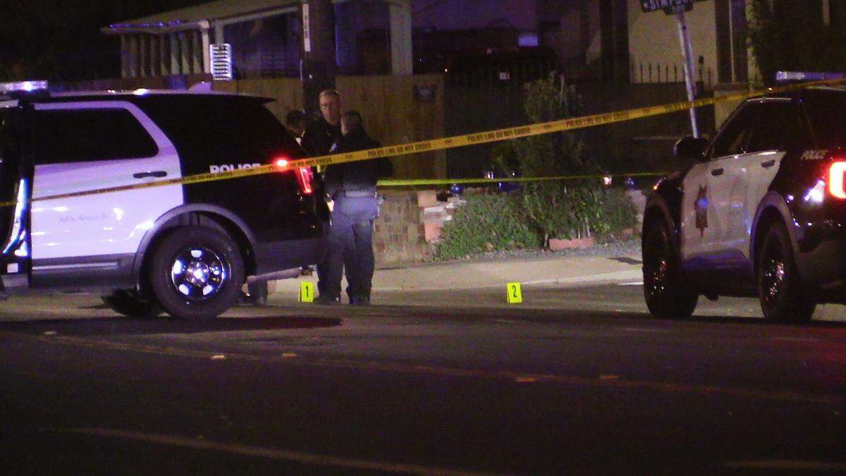 Officers investigate the scene where a woman was struck by gunfire Tuesday, Sept. 12, 2023, at her Fresno home near Fruit and Simpson avenues, according to police.