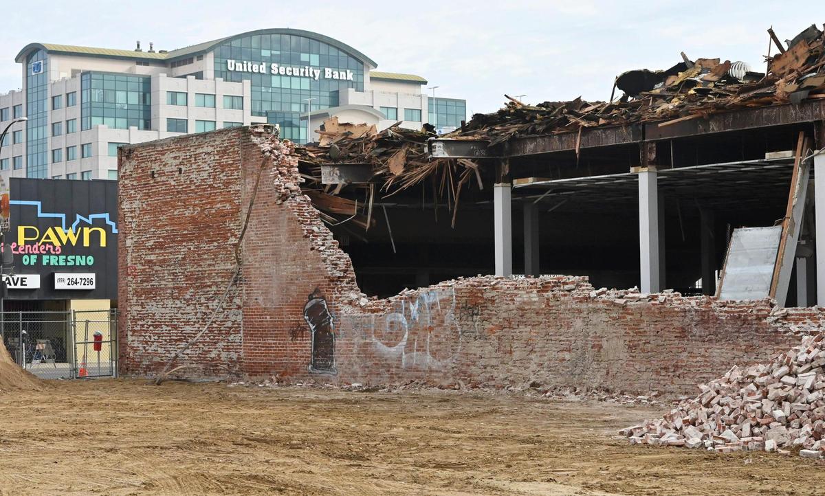 The north side of the Fink & Skopp building located along Van Ness Avenue near Tulare St., shows demolition work, shown Friday, Jan. 19, 2024 in downtown Fresno.