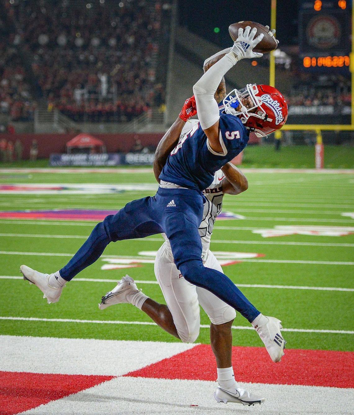 Fresno State’s Jalen Cropper leaps for a touchdown catch in the end zone during their game against UNLV at Bulldog Stadium on Friday, Sept. 24, 2021.